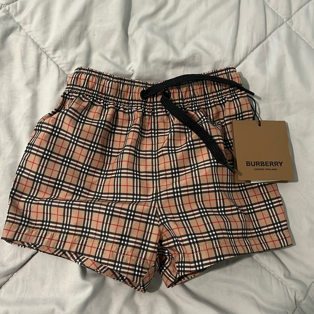 Six month new with tag authentic Burberry swim trunks boys